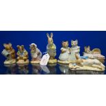 A COLLECTION OF ROYAL ALBERT BEATRIX POTTER FIGURES to include Peter with Daffodils (7)