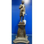 AN EDWARDIAN BRONZE FIGURE OF A SUITED MAN, with an Art Nouveau base, 'Power Progress and