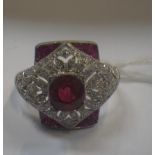 A VICTORIAN STYLE RUBY AND DIAMOND RING, on an unmarked white metal shank, ring size N