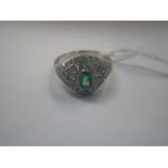 A VICTORIAN STYLE EMERALD AND DIAMOND DRESS RING, on an unmarked white metal shank, ring size N