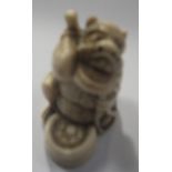 A JAPANESE IVORY NETSUKE