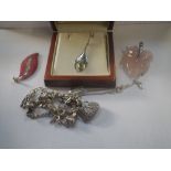 A SILVER AND "PERIDOT" PENDANT, on a fine link chain, with en suite earrings and A COLLECTION OF
