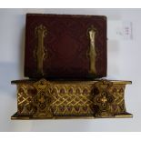 A VICTORIAN PHOTOGRAPH ALBUM with a brass royal armorial, containing Victorian portrait