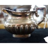 SILVER CREAM JUG, with part-fluted decoration (c. 4.6oz)
