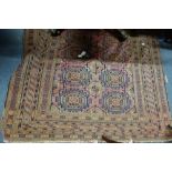 A PINK GROUND PERSIAN RUG with allover geometric decoration, 128cm wide x 218cm long (approx)