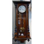 A 19TH CENTURY WALNUT AND EBONISED CASED VIENNA STYLE CLOCK