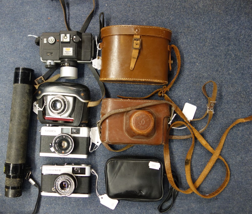 AN OLYMPUS TRIP 35 CAMERA and similar