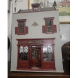 A FULLY FURNISHED PERIOD STYLE DOLLS HOUSE "Mabel's Tearoom", 46cm wide