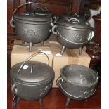 A COLLECTION OF SMALL CAST IRON LIDDED CAULDRONS, some boxed, 15cm diam
