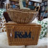 A HAMPER BASKET and another wicker basket