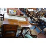 AN EDWARDIAN OAK 'X' FRAME CHAIR, a mahogany tripod table and a hardwood bedside table (3)