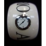 EMPORIO ARMANI, LADY'S EMBOSSED DESIGNER BANGLE, with inset white watch dial, black steel hands,