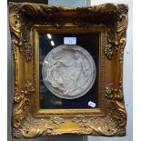 A MARBLE RELIEF ROUNDEL after E W Wyon set behind glass in a heavily moulded gilt frame