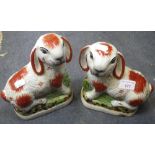 A PAIR OF REPRODUCTION STAFFORDSHIRE STYLE RABBITS