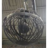 AN IRON "SHIP'S LANTERN" formed as three concentric swivelling rings within a spherical metal cage