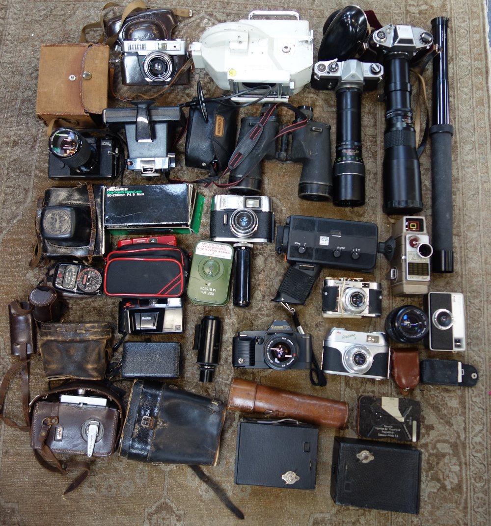 A COLLECTION OF CAMERAS AND BINOCULARS