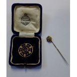 AN AMETHYST AND SEED PEARL CIRCULAR BROOCH, together with a stick pin