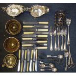 A COLLECTION OF SILVER PLATE to include bottle stands and cutlery