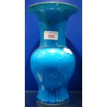 A BLUE GLAZED CHINESE VASE, 25cm high