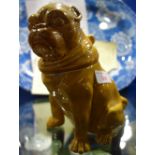 A 19TH CENTURY YELLOW GLAZED CONTAINER in the form of a pug, 21cm high