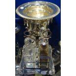 A SILVER PLATED WINE COOLER and a plated cruet with cut glass bottles (2)