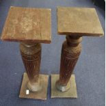A PAIR OF INDIAN CARVED HARDWOOD COLUMN STANDS, 82cm high