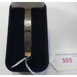 A HALLMARKED TORQUE BANGLE, 18gm, in a fitted velvet presentation case
