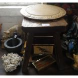 A 19TH CENTURY ELM STOOL, a vintage carved bread board and other items