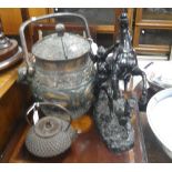 A KITSCH ORIENTAL STYLE CAST METAL ICE BUCKET with liner, a cast metal teapot and a spelter Marly