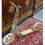 A VINTAGE TRI-ANG CHILD'S SCOOTER
