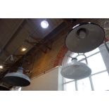A GALVANIZED STEEL INDUSTRIAL HANGING LAMP, 50cm diam, another similar in white enamel and a smaller