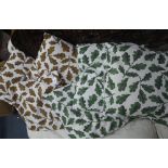 SIX SCATTER CUSHIONS printed with oak leaves in green and brown