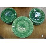 A PART SERVICE OF GREEN GLAZED LEAF DISHES AND PLATES