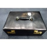 AN AMIET LEATHERETTE JEWELLERY CASE, with carrying handle and six-digit security lock
