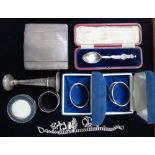 A SILVER SPOON, with a figure, S Africa 1900 (boxed) silver napkin rings and similar items