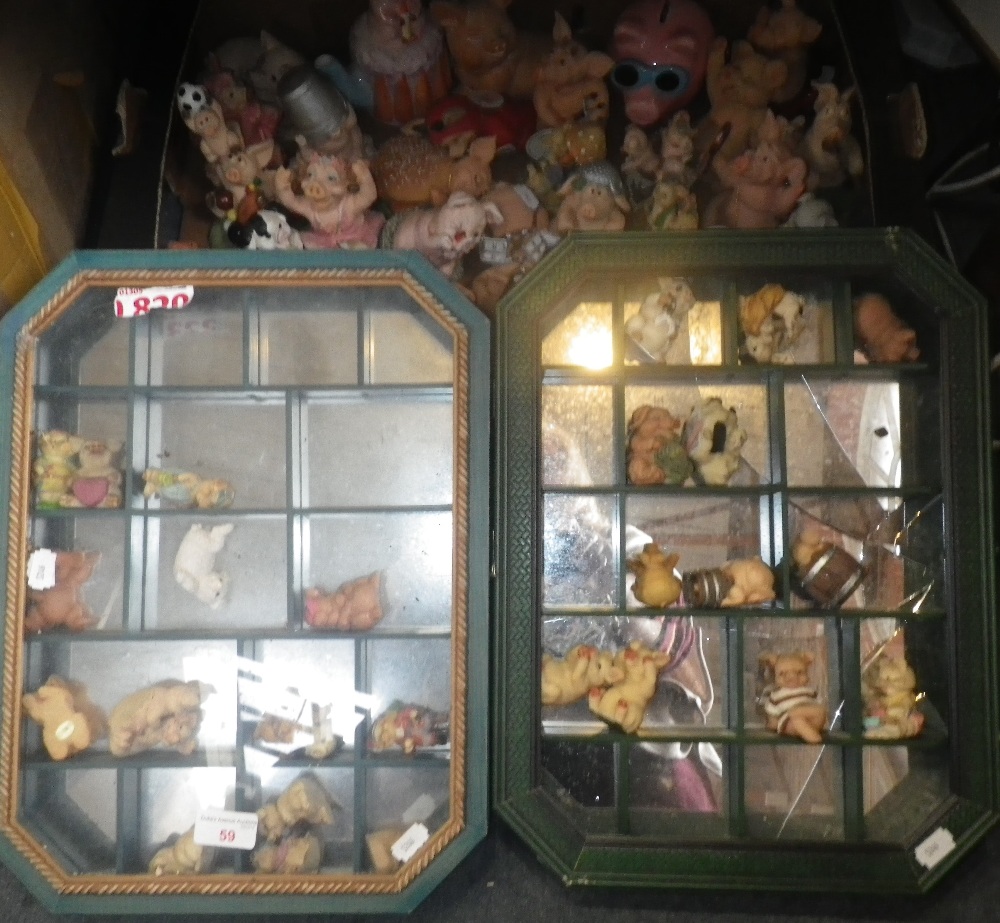 A COLLECTION OF PIG ORNAMENTS, some in display cases