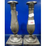 A PAIR OF EARLY 18TH CENTURY PEWTER CANDLESTICKS with touch marks and engraved initials, 20.5cm