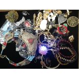 A LARGE COLLECTION OF COSTUME JEWELLERY, including an chunky Egyptian revival necklace and a novelty
