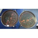 A PAIR OF CIRCULAR BRASS OCCASIONAL TABLES, the tops decorated with horse riding scenes, 42cm dia.