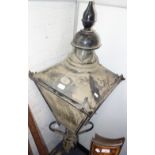 A VICTORIAN STYLE BLACK PAINTED COPPER STREET LAMP by D W Windsor mounted on a wall bracket
