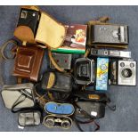 A VINTAGE IKONTA FOLDING CAMERA and a collection of cameras