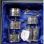 SILVER CONDIMENT SET, by Elkington & Co, Birmingham, 1974, comprising two mustard-pots, two salt-