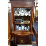AN EDWARDIAN GLAZED MAHOGANY DISPLAY CABINET with a marquetry inlaid door, 67cm wide
