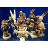 A COLLECTION OF HUMMELL FIGURES, three Sylvac bunnies and a ceramic zebra