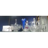 A COLLECTION OF GLASSWARE including decanters