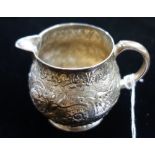 GEORGE II SILVER CREAM JUG, maker IC pellet below, London, 1735, 7cm high (c.3.9oz)