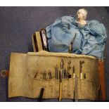A 1920S 'LADY' TELEPHONE COVER with a wax head and bisque hands, a set of drawing instruments and