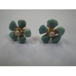 A PAIR OF FLORAL EAR STUDS, decorated with turquoise petals and a small cultured pearl to the