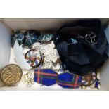 A COLLECTION OF JEWELLERY and badges