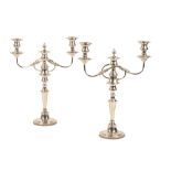 A PAIR OF SILVER PLATED THREE-LIGHT CANDELABRA, the columns of knopped circular form, scroll arms